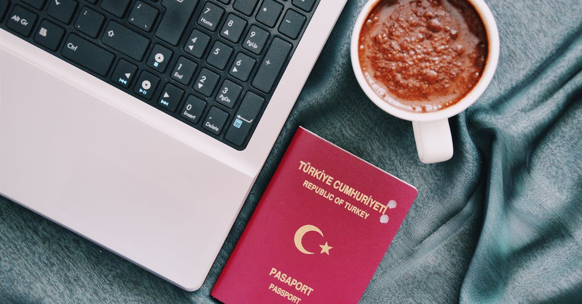 British passport on a desk with travel essentials